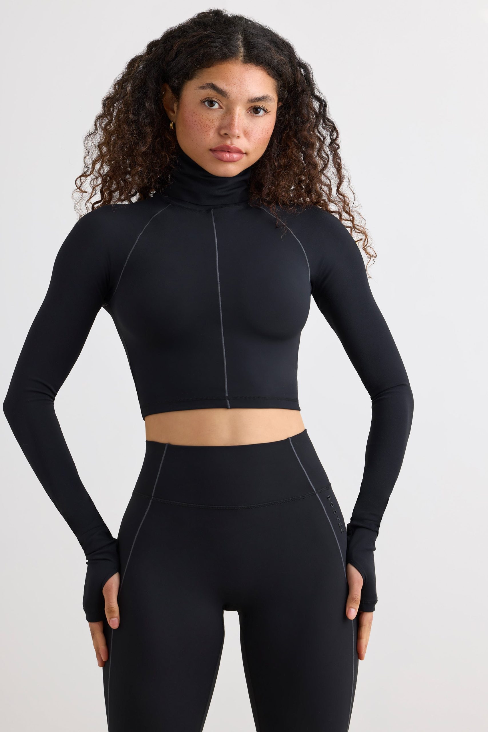 Soft Active Turtleneck Crop Top in Black - Image 7