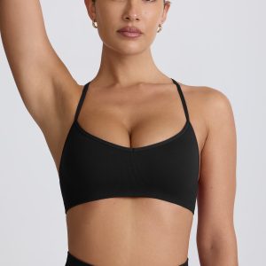 Super Sculpt Seamless Cross-Back Sports Bra in Black