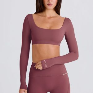 Four-Way Stretch Multiway Long-Sleeve Crop Top in Acai